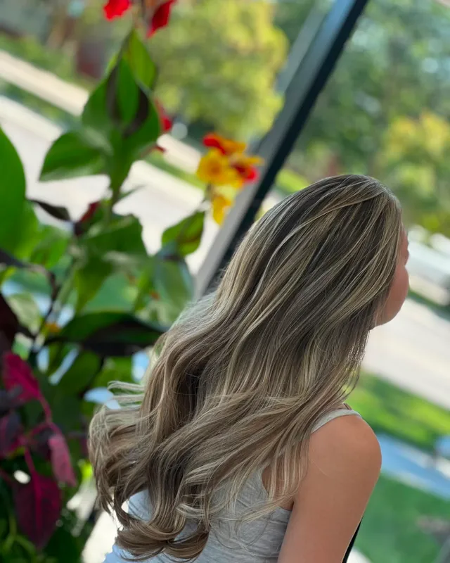 Lived-in balayage grown through long waves